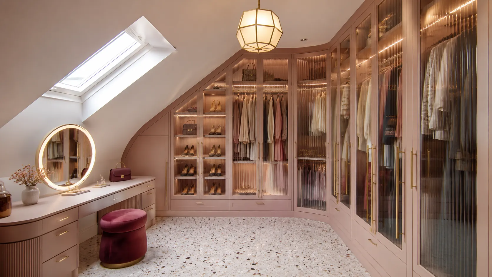 Loft wardrobe lighting integrated into glass-fronted storage and shoe shelves