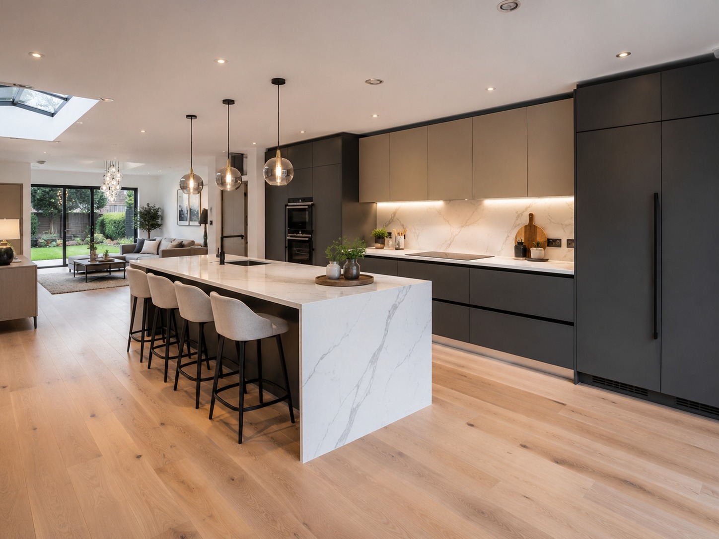 Contemporary fitted kitchen with a large island and coordinated cabinetry